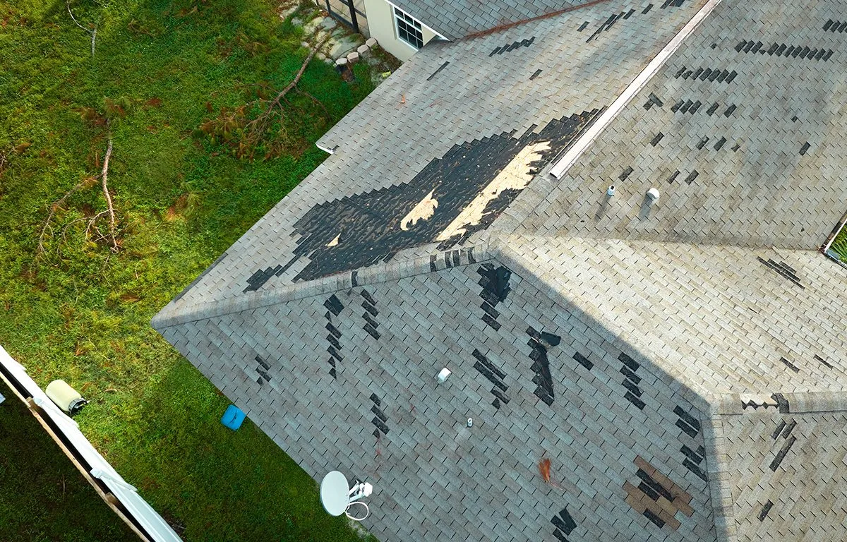 Damaged roof from serious thunderstorm.